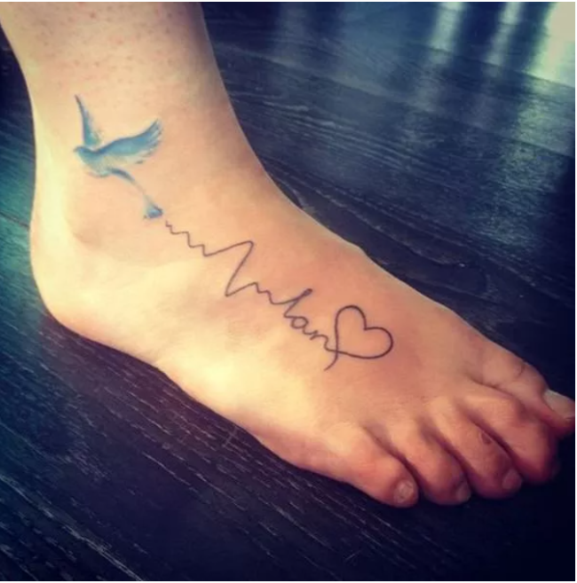Bird Heartbeat tattoo on leg