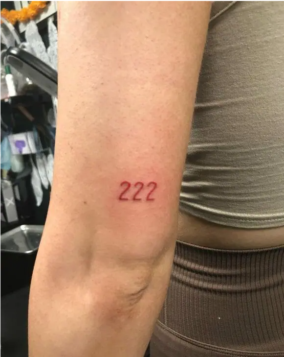 red 222 tattoo